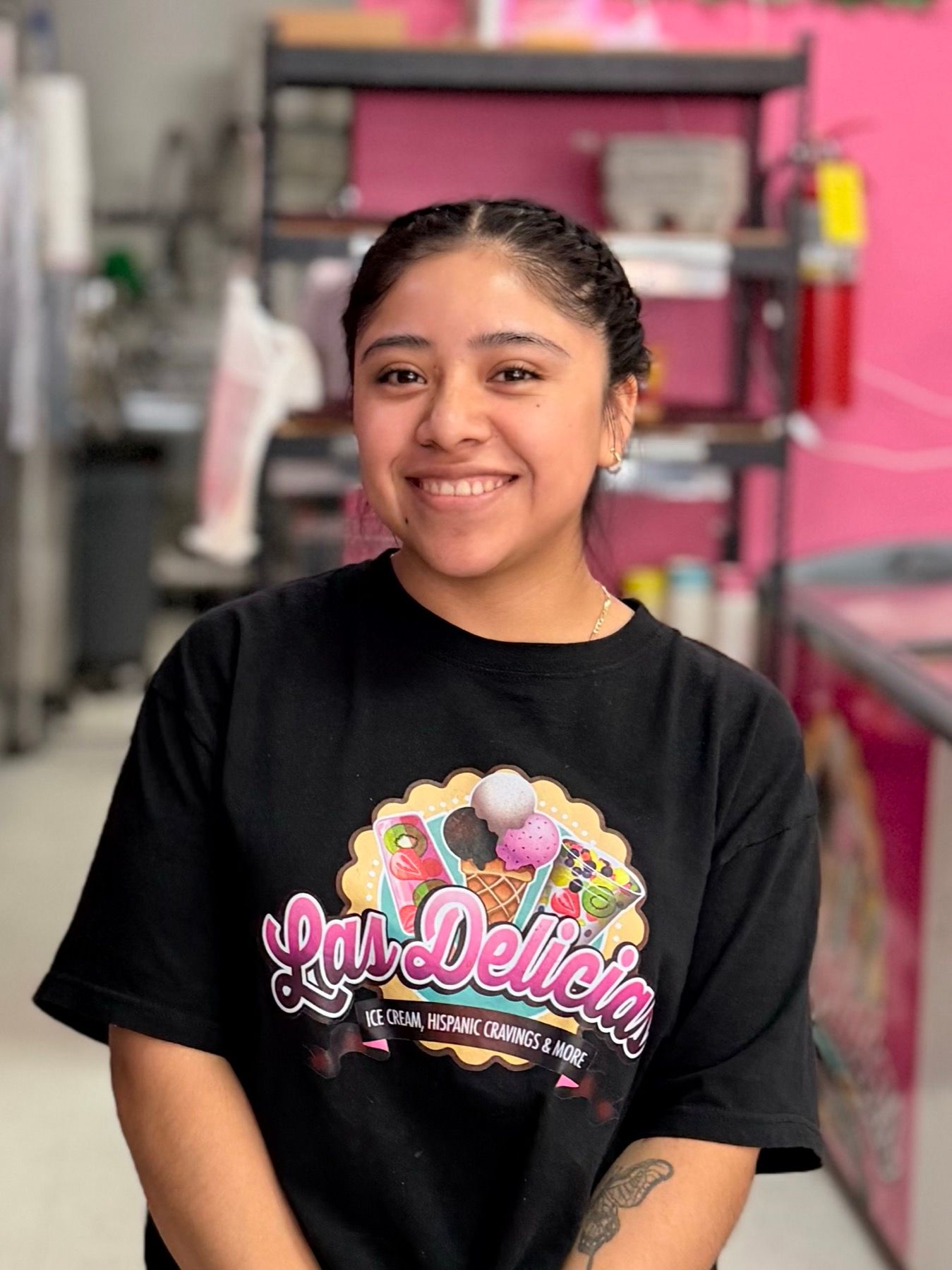 Las Delicias team member smiling in the shop